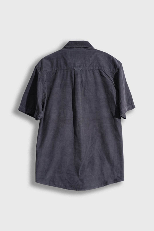 Dark gray short-sleeve shirt on a light gray background
