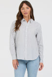 Woman wearing a striped shirt and jeans on a white background