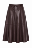 maroon, faux leather skirt with tie waist against a white background