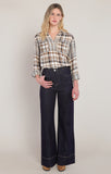 woman in plaid shirt and jeans with white background